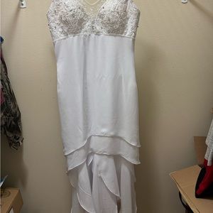 White sleeveless partially embroidered flowy dress